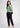 Golden olive shirt with black trousers, full-length office look
