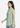 Golden olive sleeveless top, three-quarter side view