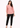 Light pink V-neck top with black trousers, full-length look