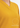 V-neckline and textured fabric close-up, mustard gold top