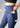 Navy flare pants, phone pocket close-up