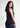 Navy sleeveless top, side view, flared hem