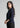 Navy textured shirt top, angled side view