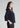 Navy shirt-style top for women, side view