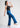 Model in ocean blue wide leg trousers, side pose