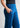 Side pocket and waistband close-up, ocean blue trousers