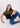 Olive-black boxy crop top, seated pose