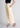 Petal cream cotton trousers, side view