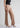 Rosewood beige pintuck trousers, angled front view