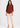 Rust shirt top with cream trousers, full length