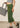 Sage green cotton capri, styled with a handbag