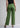 Sage green cotton trousers, back view