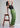 Sage green cotton trousers, full-length view