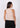 Skin-tone ribbed tank top, back view
