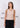 Skin-tone ribbed tank top, with feature labels