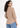 Soft beige textured top, back view over the shoulder