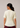 Flurr soft peplum button-down top back view, showing the full silhouette 