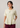 Flurr soft peplum button-down top front view, showing the round neckline and mock button detail