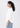 White textured top with three-quarter sleeves, side profile