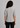 Back view of Flurr women’s ruffle-collar officewear top showcasing the relaxed fit and polished professional workwear design